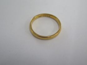 A 22ct yellow gold hallmarked band ring size L - approx weight 3.1 grams