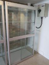 A large good quality shop display cabinet with sliding doors - Height 183cm x Width 100cm x Depth