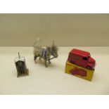 A boxed Dinky Dunlop Trojan van in good condition, minor blemishes, a tinplate AA box and a