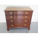 A Georgian mahogany chest of drawers with four graduating drawers on bracket feet - Height 82cm x