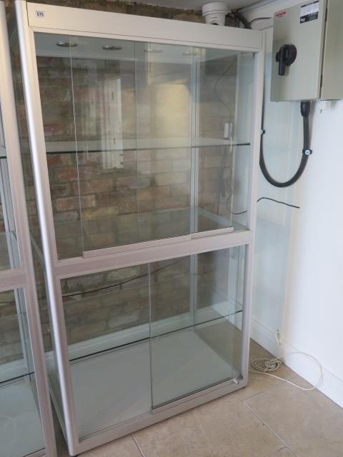 A large good quality shop display cabinet with sliding doors - Height 183cm x Width 120cm x Depth
