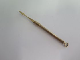 A hallmarked 9ct yellow gold fob toothpick - approx weight 2.7 grams