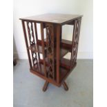 A small mahogany rotating bookcase - Height 75cm x 38cm x 38cm