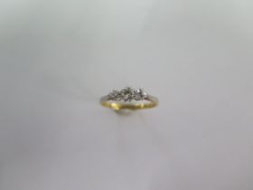 An 18ct yellow gold and platinum three stone diamond ring size K/L - approx weight 1.8 grams -