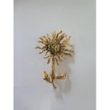 A yellow metal floral enamel brooch - Length 5cm - approx weight 11 grams - surface tests to