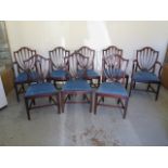 A set of eight mahogany dining chairs including two carvers - in good condition