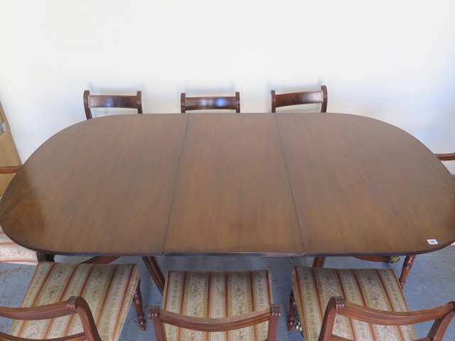 A Georgian style mahogany twin pedestal dining table with one leaf - Height 74cm x 204cm x 114cm - Image 2 of 5