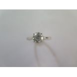 A platinum diamond solitaire ring - diamond weight approx 1ct - head size approx 7.5mm diameter -