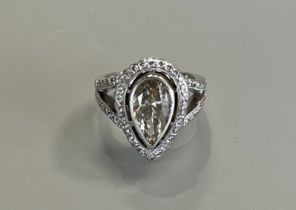 An impressive pear cut 18ct white gold diamond ring - the natural pear cut diamond measures approx