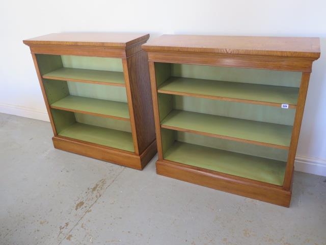 A pair of burr oak open bookcases with adjustable shelves and painted interior - made by a local