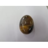 A Tigers Eye stone egg - 33mm tall - traditionally Tigers Eye was to ward off evil