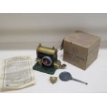 An S.E.L Model Junior static steam engine, with box and instruction