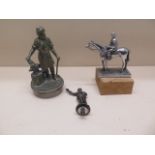 Three figural car mascots - Dart player, Jockey and horse and Blacksmith - Height 14cm