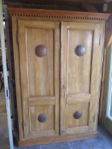 A Victorian pine two door kitchen larder cupboard with a shelved interior - Height 197cm x 138cm x
