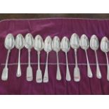 A collection of 11 silver table spoons - Largest 23cm - assorted makers and years - total weight