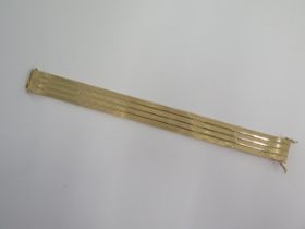 A 9ct yellow gold bracelet - 17.5cm long x 1.48cm wide - approx weight 26.7 grams