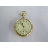 A gold plated Waltham top wind open face pocket watch - 54mm case - in running order, cracks to dial