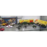 A Dinky Supertoy 660 tank transporter boxed, a Dinky 697 Pounder Field Gun set and other toys as