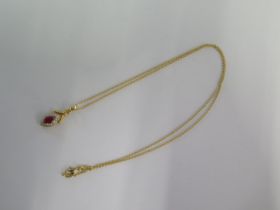 An 18ct yellow gold diamond pendant on an 18ct 46cm chain - total weight approx 4 grams - in good