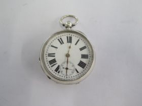 A silver top wind pocket watch - 53mm case - generally good, running order