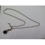 A white metal fob on a 66cm chain