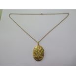 A 9ct yellow gold locket on a 9ct 50cm chain - locket approx 42mm x 32mm - total weight approx 17