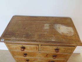 A Victorian five drawer pine chest of drawers with original grained finish - Height 107cm x 92cm x