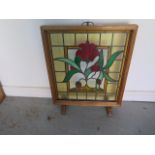 A stained glass fire screen - Height 73cm x 61cm - in good condition