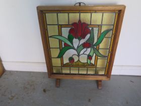 A stained glass fire screen - Height 73cm x 61cm - in good condition