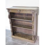 A carved oak open bookcase - Height 105cm x 90cm x 33cm