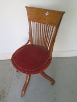 A 1920's oak desk chair