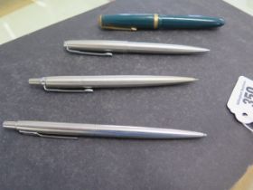 2 Parker Pens ball point pens and a Parker fountain pen and a pencil