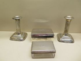 A silver desk box - Width 11cm (worn) a silver top glass trinket box and a pair of weighted silver