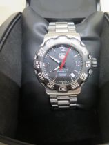 A Tag Heuer Formula 1 quartz gents bracelet wristwatch with black dial - model WAC 1110 serial