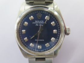 A 1973 Rolex Oyster Perpetual stainless steel Air-King bracelet watch with blue dial and diamond