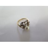 An 18ct yellow gold pearl ring - missing a pearl - ring size M - approx weight 3.4 grams