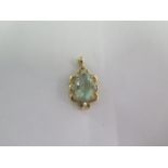 A 9ct yellow gold flourite and diamond pendant - 27mm tall - approx weight 5 grams - good condition,