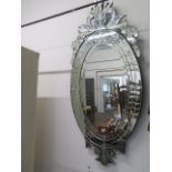 A Venetian style ornate mirror - 144cm x 64cm