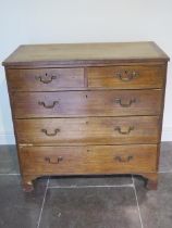 A Georgian mahogany five drawer chest on shaped bracket feet - some beading losses - Height 91cm x