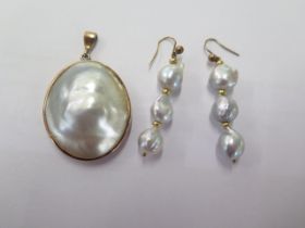 A pearl gilt mounted pendant - 34mm x 24mm and a pair of pearl drop earrings