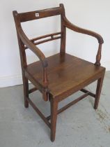 An 18th century oak arm chair with a nice patina