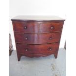 A Georgian mahogany four drawer bow fronted chest on bracket feet - Height 91cm x 89cm x 50cm