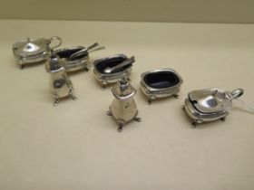 A silver seven piece cruet with four blue glass liners - total weighable silver approx 7.1 grams -