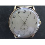 A 9ct yellow gold Arcadia manual wind gents wristwatch, 33mm case, weight without strap approx 23