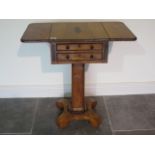A 19th century satin walnut and ebony strung drop leaf work table with a single double drawer on