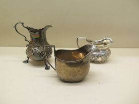 Three silver milk/cream jugs - total weight approx 13.7 troy oz