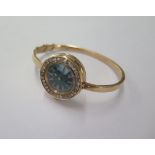 A diamond set gilt metal manual wind wristwatch on a later hollow hinged bangle - 25mm case -