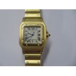 A Cartier 18ct yellow gold gents Santos date quartz bracelet wristwatch no 887901 0878 - 29mm case -