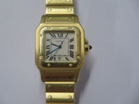 A Cartier 18ct yellow gold gents Santos date quartz bracelet wristwatch no 887901 0878 - 29mm case -