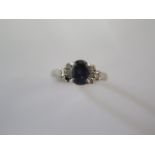 A platinum ring size P/Q - missing a small stone, worn to shank, otherwise good